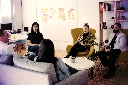 people seated on table in room